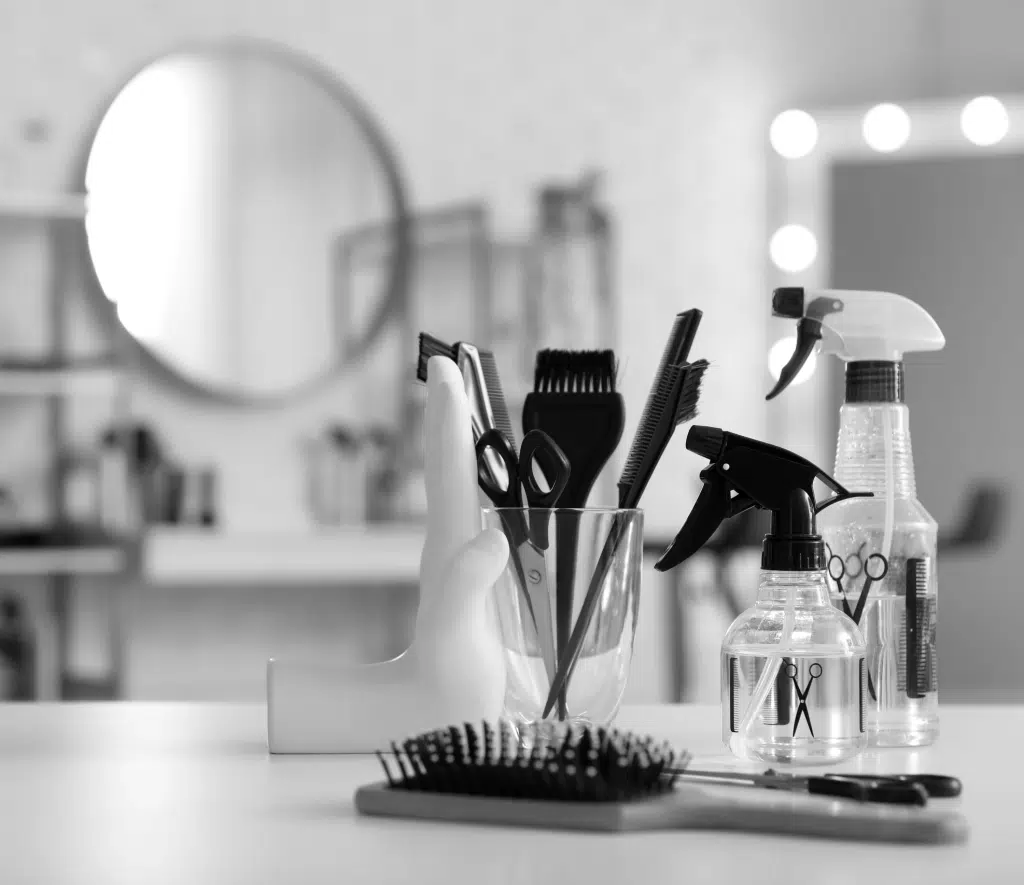 a table full of hair stylist supplies to represent a beauty professionals and owners insured by BeautyGuard